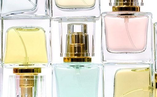 colorful perfume bottles arranged in a row