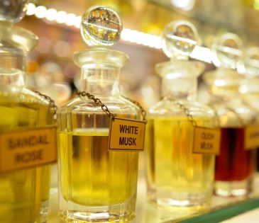 row of vintage perfume bottles