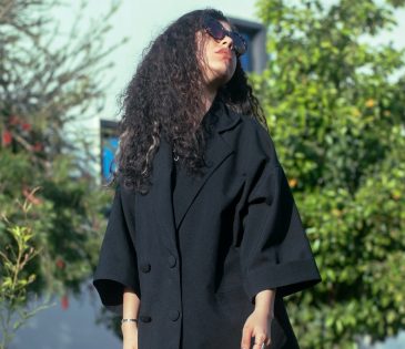 A woman dressed in black