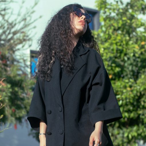 A woman dressed in black