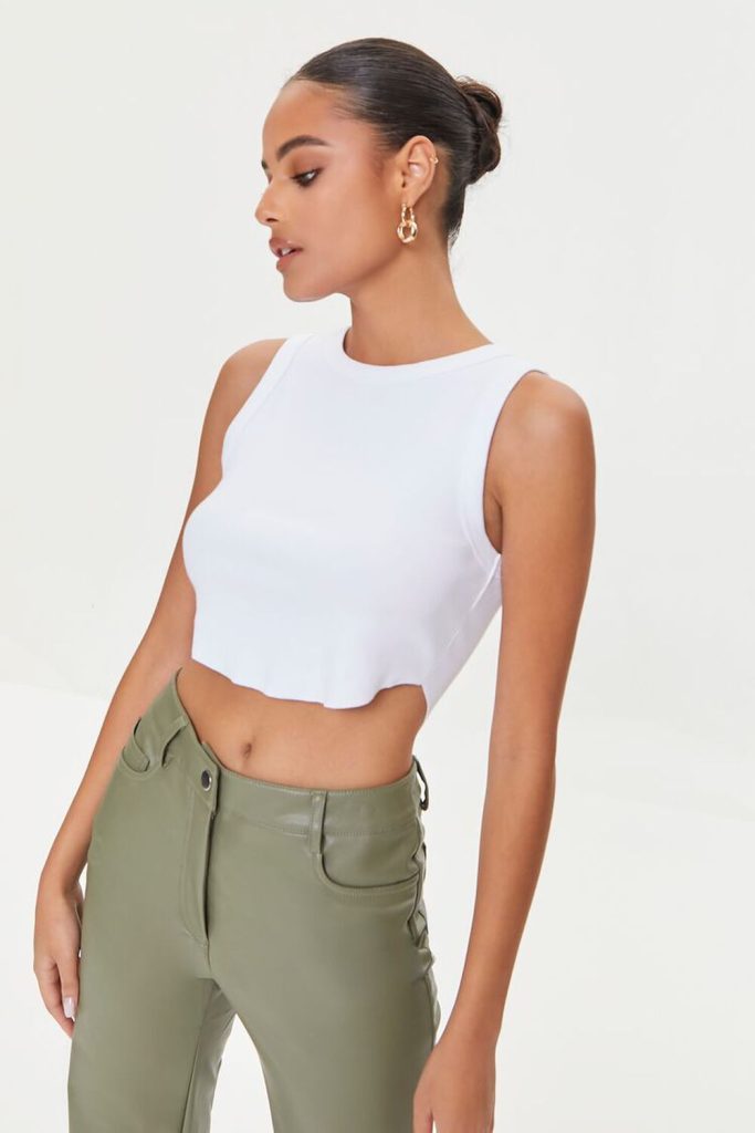 woman wearing a simple white tank top
