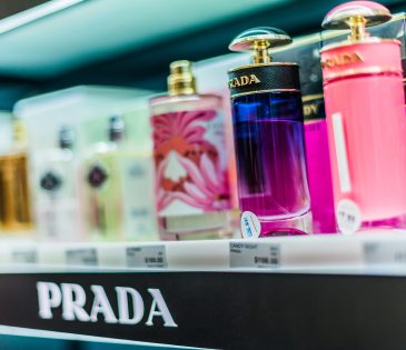 Bottles of perfume by Prada on a store shelf