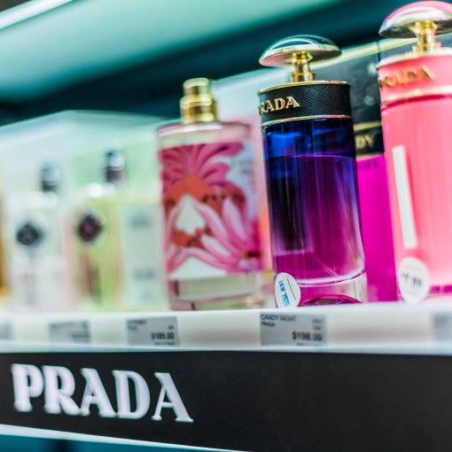 Bottles of perfume by Prada on a store shelf
